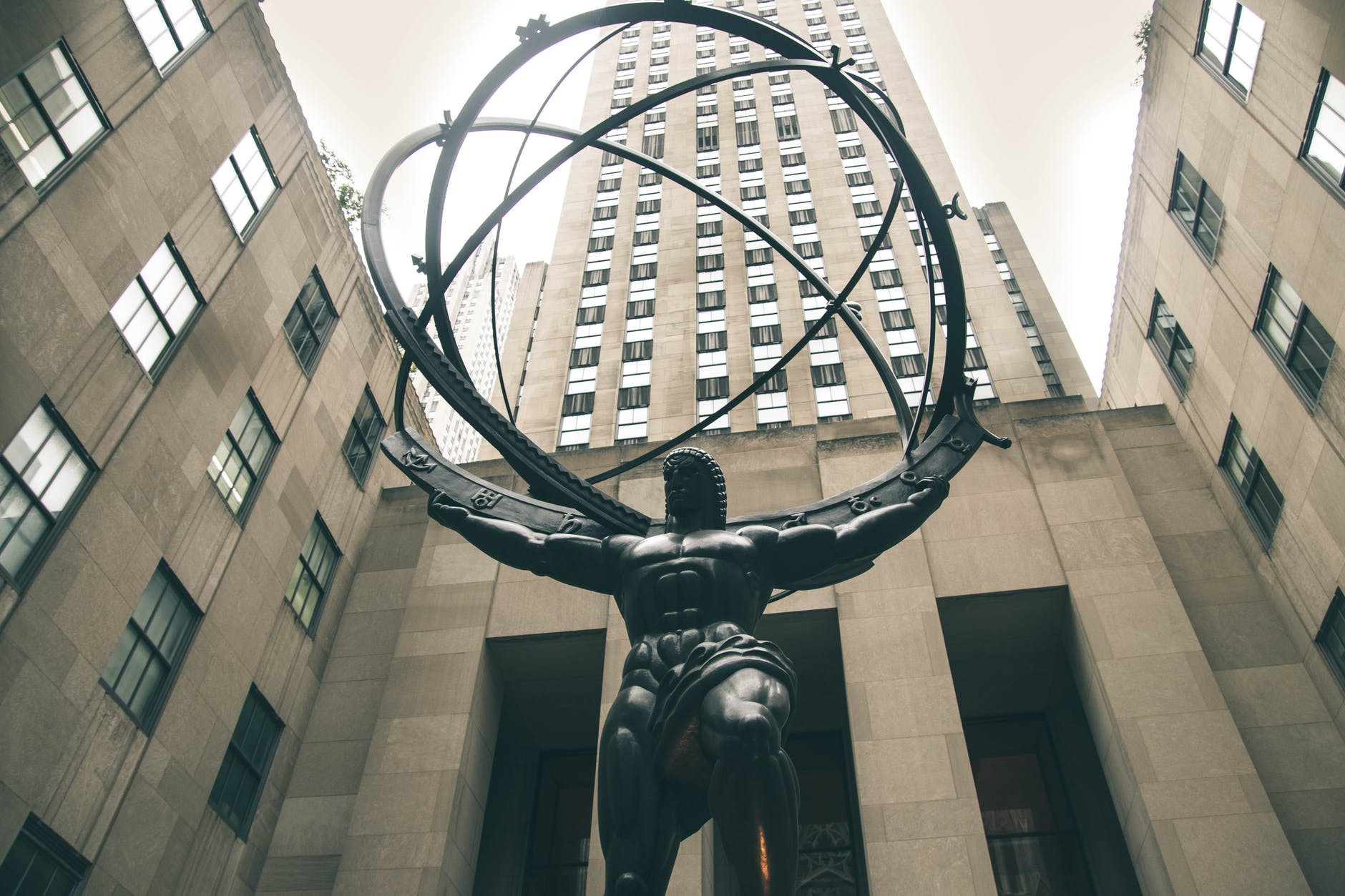 low angle photography of atlas statue