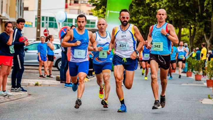 four men running on