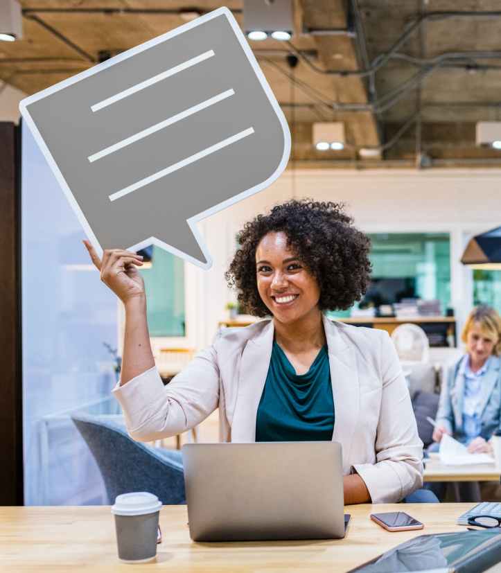 smiling woman using laptop computer